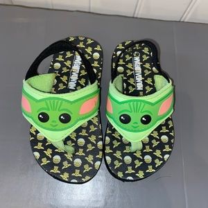 Two pairs of toddler water shoes - yoda/mandalorian and grey and blue Nike